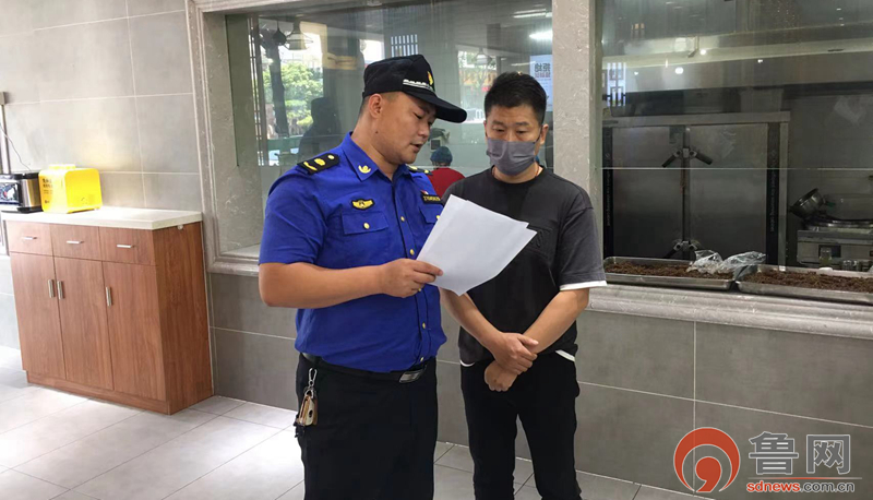 棗莊市薛城區綜合行政執法大隊開展“門前三包”聯合整治活動
